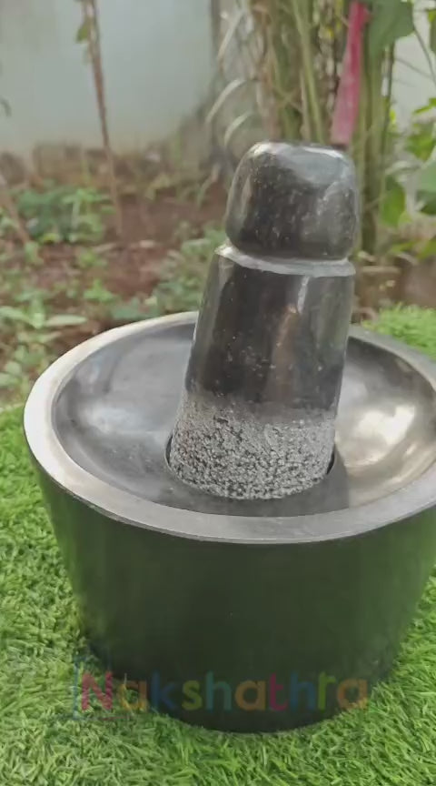 Load video: Traditional Black Stone Polished Attukal for Home Kitchens (B * H - 10 * 6 Inch)